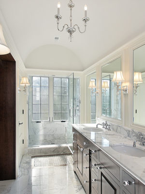 Master bath in new construction home with marble shower